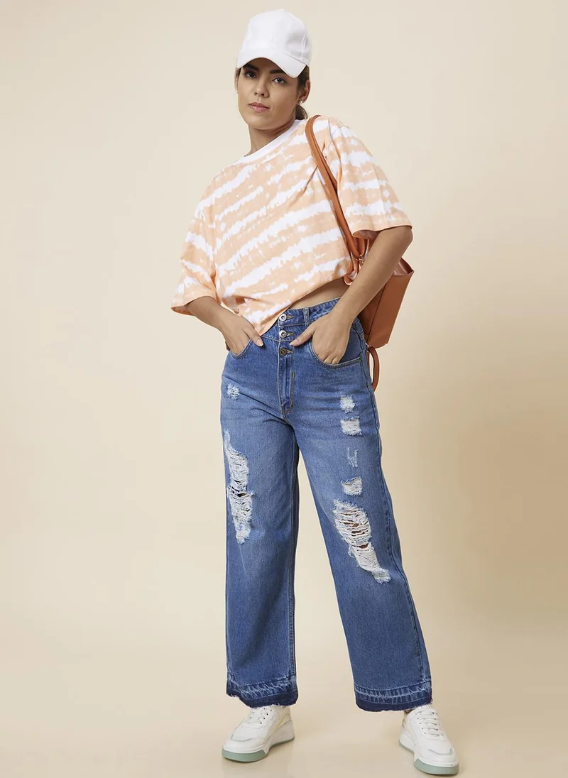 جلو باص جينز نسائي واسع الساق أزرق فاتح بتصميم ممزق من القطن الخالص من جلوبس